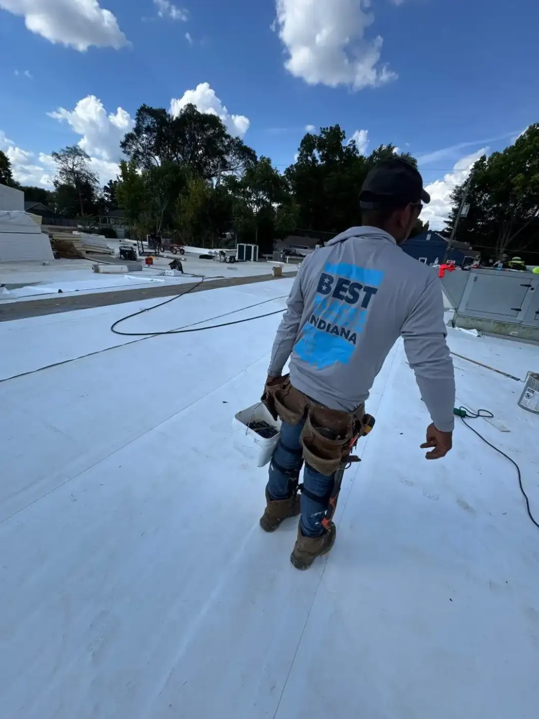 Tarping and dry-in on a Carthage commercial roof